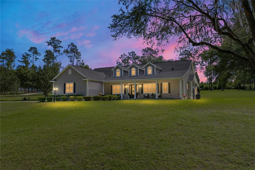 A timeless country residence set on nearly 3 scenic acres, nestled behind mature trees, and with a host of recent updates, is ready for its newest chapter. Providing 3 bedrooms, 3 bathrooms, a 2 car garage, a 2022 roof, 2018 + 2020 AC units, a 2024 water heater, updated kitchens and bathrooms, this home has been meticulously maintained and is move in ready! A peaceful setting with birds chirping, sunlight filtering through the trees, and an approach with brick pavers and classic front porch welcome you right into the home. Warm wood flooring and crown molding flow throughout the space creating easy connections and an elevated aesthetic. A wood burning fireplace, custom built-ins, French doors to the patio and high ceilings highlight the expansive living room. The kitchen has been beautifully updated for style and function. It features granite countertops, stainless steel appliances (including a new Subzero refrigerator still under warranty), plenty of storage, a central island, breakfast bar seating, a built-in desk nook, a large walk-in pantry, and a cozy sun-filled eat-in dinette. Near the front of the home, the formal dining room and dedicated office add extra convenience for gatherings and a private work from home space. The primary suite is separated from the guest bedrooms and offers a spacious bedroom, access to the screened back porch through French doors, an oversized walk-in closet, and an updated ensuite bathroom with 2 separate vanities, a soaking tub, and a walk-in shower. On the opposite side of the home, 2 bedrooms with plush carpeting share a 2024 updated Jack and Jill style ensuite bathroom in-between. The interior also provides a custom laundry room with built in clothing organizers, a 3rd full bathroom for guests, and interior paint refreshed in 2021. Head outside through the French doors onto the brick paved and screened back porch that overlooks the lush acreage. Here you can dine alfresco, extend your living space outdoors, or simply enjoy the calm surroundings. Several outdoor upgrades have been completed as well including upgraded Hardie Board, an added storage shed, 2022 exterior paint, 2025 pumped septic tank, irrigation on the whole property, and a 2025 gutter system. Chickens and 1 grazing animal per acre are permitted for those that want to bring their animals and take advantage of the country setting! This home is located in a place that feel tucked away but is just a short drive to local conveniences and major roadways. Give us a call today for your private viewing of Savannah Oaks.