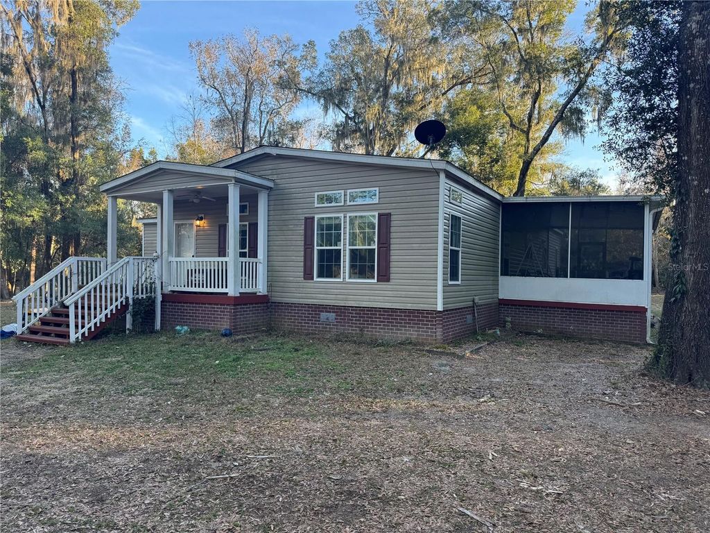 Photo of 1085 State Road 100, Florahome, FL 32140 (MLS # GC536884)