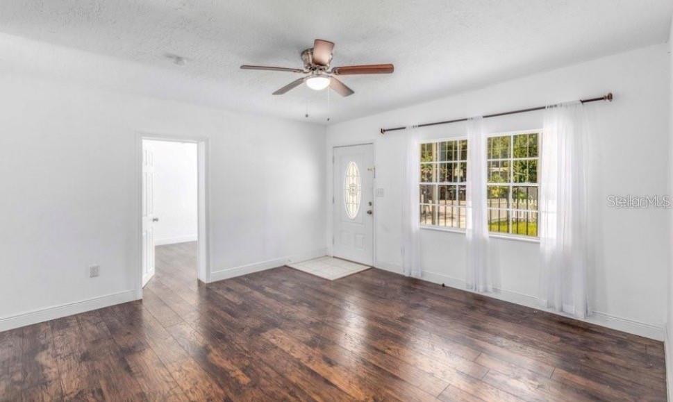 Photo of 1625 Queensway Road, Orlando, FL 32808 (MLS # O6423048)