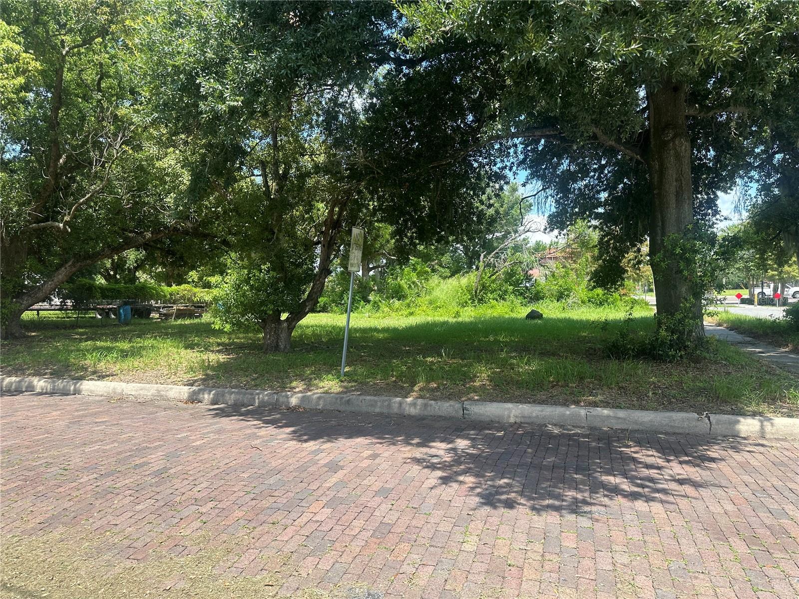 *Great Opportunity*Great Location, 3 combined lots selling as one unit situated off Parker St. adjacent to Florida Ave. with heavy vehicle traffic count. This area is located in an opportunity zone close to the heart of downtown Lakeland part of the Mid Town CRA district. This property possesses immense potential for rezoning development due combined lots and location. The possibilities are limitless with this location. Please use due diligence when researching and contact proper officials. (Additional combined lots 120 W. Parker, N. Missouri Ave.)