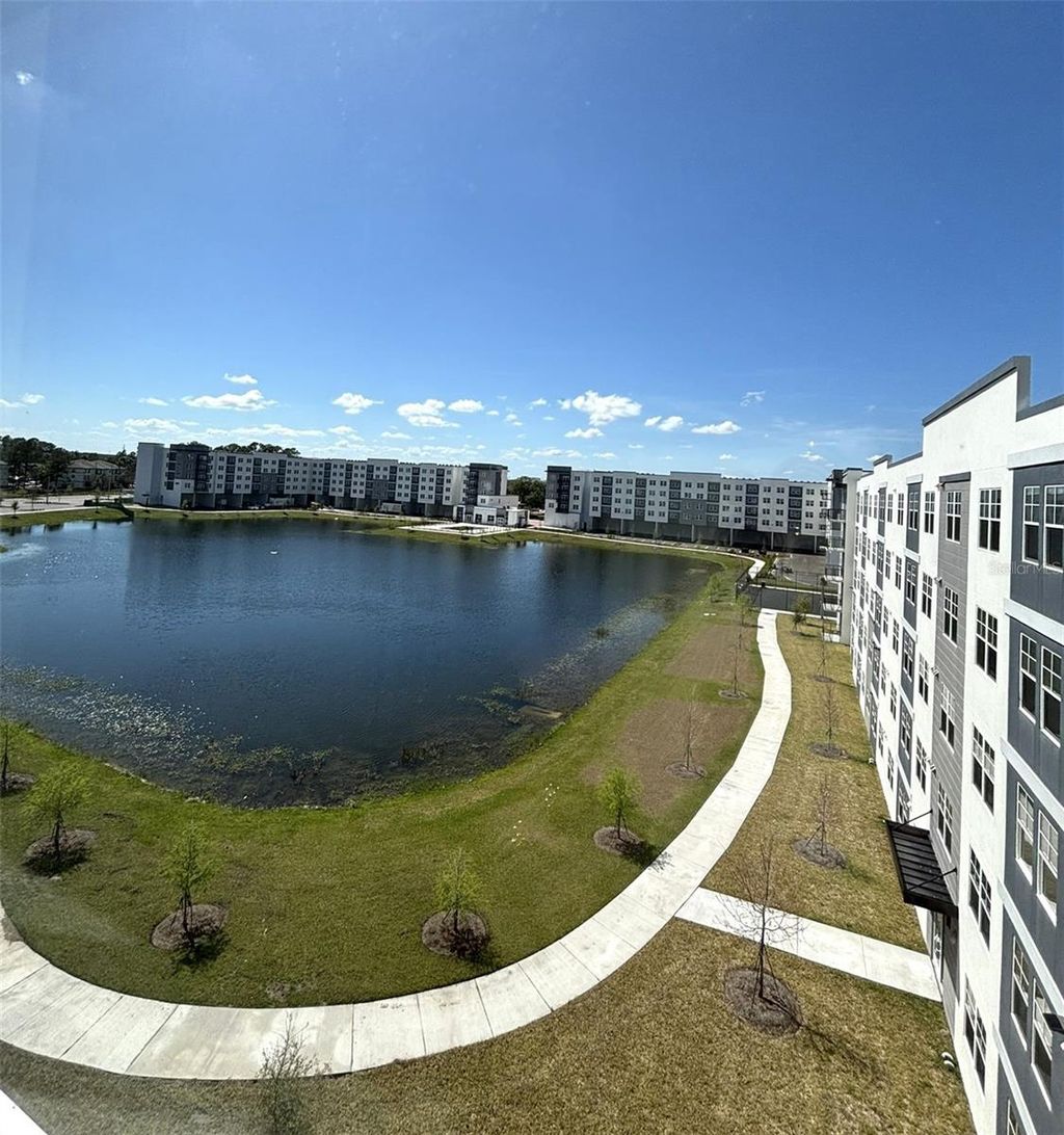 Photo of 5579 Millenia Park Blvd #409, Orlando, FL 32839 (MLS # O6397237)