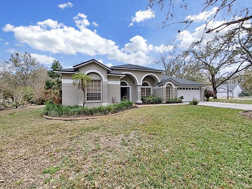 Photo of 17307 Oak Ledge Drive, Lutz, FL 33549 (MLS # TB8429933)