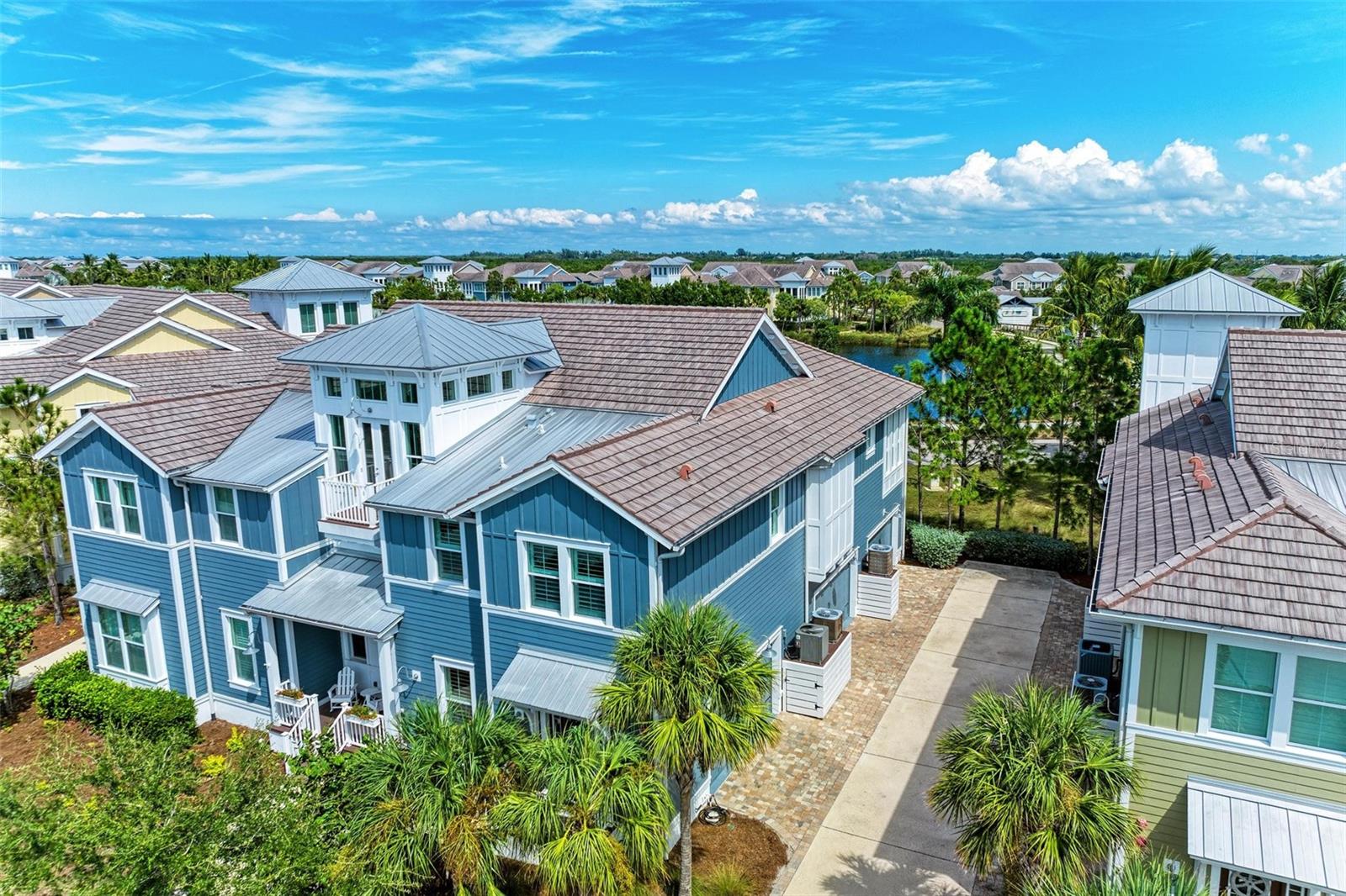 One or more photo(s) has been virtually staged. This is what you have been looking for this highly sought-after Compass Point Drive Home in beautiful Harbour Isle! Now you can live like you're on vacation in this gated coastal resort community on Anna Maria Sound. In this luxury home you can begin your mornings with a cup of coffee in your sunroom as the sun is rising over the resplendent sparkling Sapphire Lake. End your day catching peek-a-boo views of a stunning sunset over Anna Maria Sound from the front of the home or take a quick walk to the Harbour Isle Beach Club with panoramic views of the water reaching all the way to Tampa Bay. This home has proven itself safe from the winds and rains!!! This immaculate home is light and bright and has so many recent upgrades that make it almost too good to be true. Recently added features include; hot water heater, kitchen faucet, shower heads, overheard garage storage, LG side by side refrigerator, HALO water filtration system, LG washer, dryer and dishwasher, ELITE Lennox air conditioning unit and so much more. Don`t miss this amazing, custom-built Bourbon bar that is second to none and an amazing way to relax in your sunroom at the end of the day. Wood look plank tile flooring and tile throughout. French doors, vaulted ceiling with beams, upgraded ceiling fans, tray ceilings, 5 1/4 inch baseboards throughout, crown molding in entry and living area, 8 ft. solid core doors and a private elevator that opens directly from your garage to your living space on the second floor. The spacious 42-inch white wood cabinets with soft close, stainless appliances - featuring a double oven with front controls, granite counters and large island with breakfast bar are featured in this beautiful kitchen. Walk into the serene, large Owner`s retreat with views of Sapphire Lake and a large walk-in closet. The Owner`s bath features dual vanities and oversized stand alone shower. The guest bedroom has an en-suite full bath, allowing privacy for your guests. The home also features a third spacious bedroom with custom closet and sliding door. The third full bath is large and conveniently located in the hallway and easily accessible from the main living area. An amazing custom sunroom, large living area and dining room are also included on the main level. The oversized 2-car garage has 12` ceilings with overhead storage. A custom loft is built into the garage for maximum storage.While inside the gates at Harbour Isle, explore two miles of neighborhood walking and bike trails and find an inviting hammock for an afternoon siesta. Stroll to one of the four nearby neighborhood pools with outdoor grills, cabanas, fire pit, lap pool and kayak launch for the 38-acre lake. End the day with an incredible sunset at the 23,000 square foot Beach Club overlooking Anna Maria Sound. The Beach Club features resort-style amenities with the Sky Bar, Lounge, Pavilion, Fitness Center, Yoga Lawn, Event Lawn, resort pool, hot tub and a private beach to launch a kayak in the Sound. Just outside the gates of Harbour Isle, you`ll find the Jimmy Buffett Margaritaville-inspired Compass Hotel, Safe Harbour Marina with wet and dry storage, and Floridays waterfront tiki restaurant. Cross the Manatee Bridge and you`re on Anna Maria Island with its sugar sand beaches and island charm. It`s time to start living your best life. Live, relax, enjoy an active lifestyle and/or work from home in award-winning Harbour Isle. For video copy and paste to your browser:
https://vimeo.com/869690672