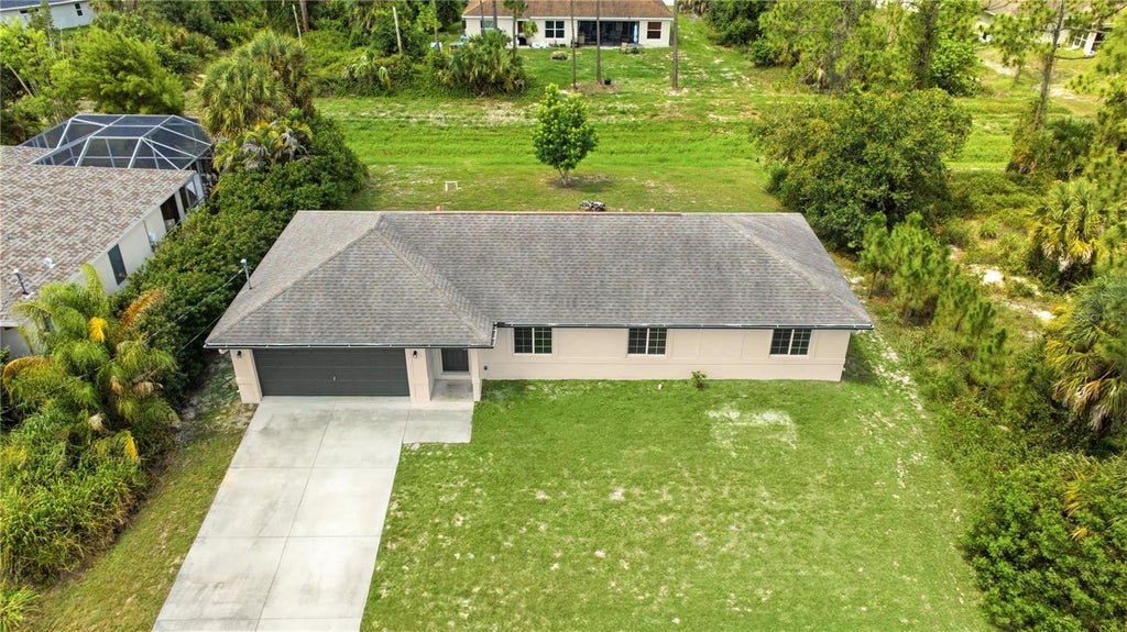 Photo of 1167 Urmey Lane, North Port, FL 34286 (MLS # A4697515)
