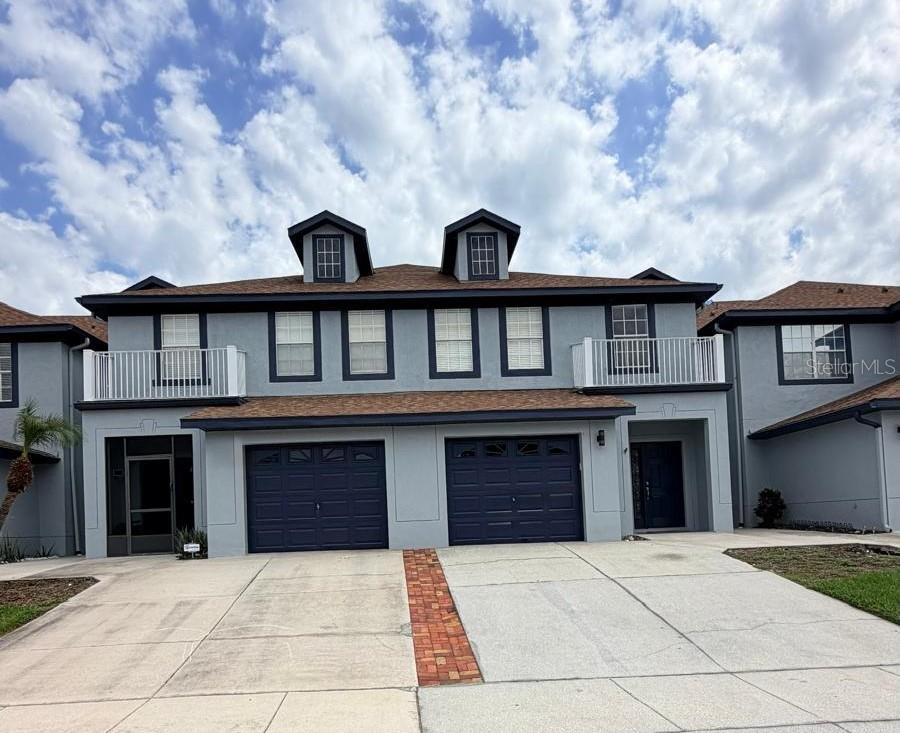 Photo of 3032 Ashland Lane S, Kissimmee, FL 34741 (MLS # O6444310)