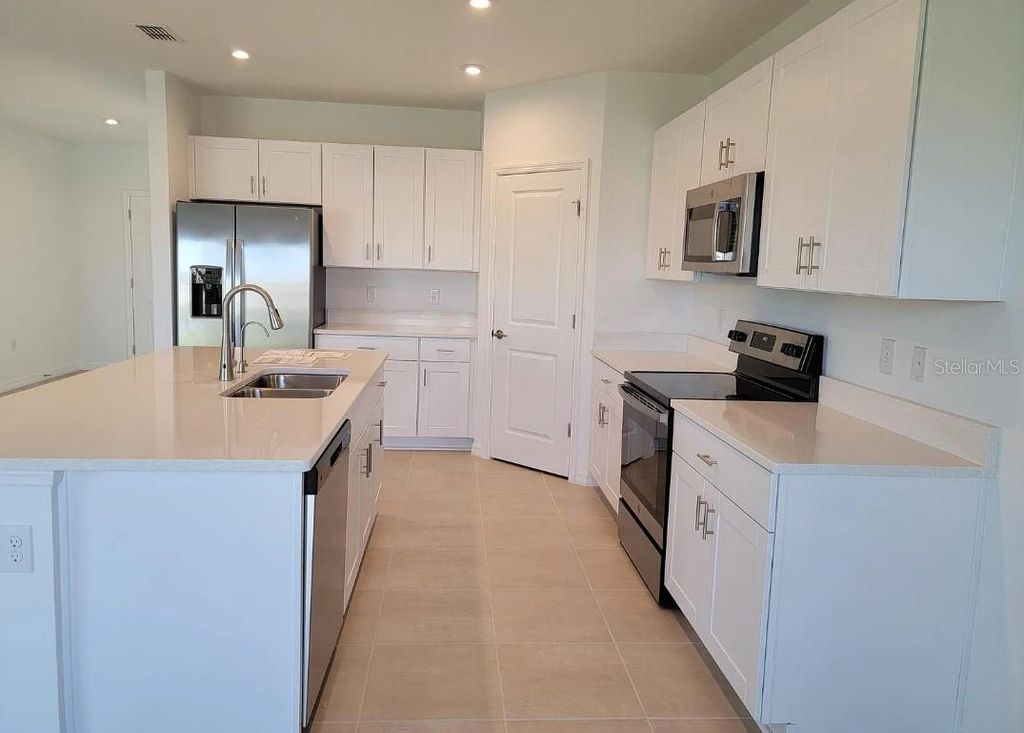 Photo of 216 Aquamarine Lane, Kissimmee, FL 34758 (MLS # O6346081)