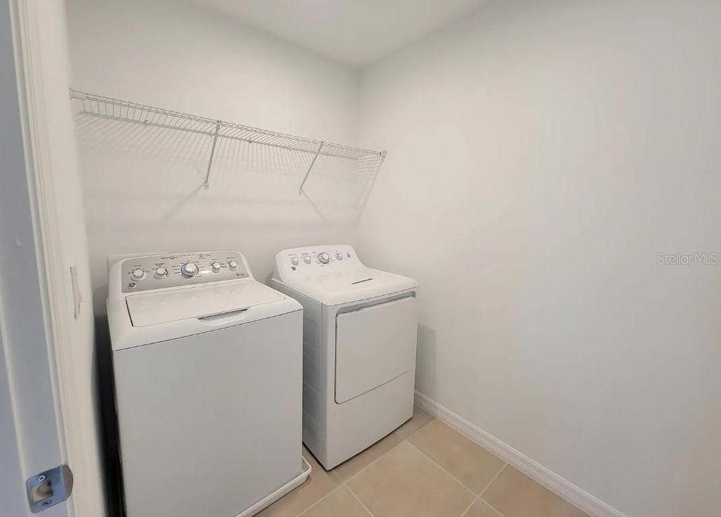 Photo of 216 Aquamarine Lane, Kissimmee, FL 34758 (MLS # O6346081)