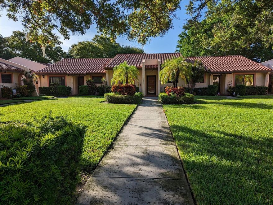 Your opportunity to live in Timberwoods waterfront community.  This cozy 1 BR villa is brimming with possibilities.  Timberwoods is a PET FRIENDLY (2 pets) up to 100 lbs. each.  NO AGE RESTRICTIONS, motorcycles allowed and is located in cul-de-sac just steps to solar heated pool, clubhouse and tennis/pickleball courts. Clubhouse can be rented for your personal use.  Just a short walk or bike ride into the side entrance of Lake Seminole Park.  The Resident Owned FL room adds additional living area and a view of the Seminole By-Pass canal where you can fish or launch your kayak. The large bedroom window gives you a nice view of canal also. HVAC 6/2016,  HOT WATER HEATER 3/2023 and Garbage Disposal 2023. MAINTENANCE FEE INCLUDED: ENHANCED SPECTRUM CABLE, INTERNET, TRASH, WATER, SEWER AND EXTERIOR. COVERED CARPORT RIGHT NEXT TO YOUR UNIT. MAINTENANCE. Timberwoods is tucked away from hustle and bustle yet only minutes from shopping, dining and beach. A great opportunity for you to re-decorate to your personal style.