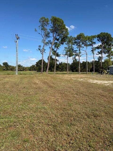 Spacious vacant lot in a vibrant 55+ community! This lot provides privacy by backing up to La Casa's 40 acres  La Casa offers the ultimate Florida lifestyle.  We have 974 home sites nestled among a variety of native trees with spacious common grounds surrounding our eight lakes.  La Casa is located between Sarasota and Fort Myers. We are convenient for shopping, sightseeing, golfing, fishing, and boating, as well as all the culture and elegance the Southwest Florida area is noted for. Wireless Internet (Wi-Fi) is available at the Clubhouse, Activity Building, and Recreation Hall area where these pools & spas are located, so you can catch some rays while you catch up on your email! Sound enticing? Come for a visit to this self-contained oasis and see for yourself why La Casa is the ultimate destination for both snowbirds and year-round residents!
Welcome to La Casa, an enchanting community where 974 exquisite homes are beautifully set among native trees, surrounded by spacious common areas and eight serene lakes. Our generous 60 by 80-foot lots offer your ideal space.  Perfectly located between Sarasota and Fort Myers, La Casa is a boater's paradise with direct access to the stunning Gulf of Mexico. Enjoy easy access to shopping, sightseeing, golfing, and fishing, all while immersing yourself in the rich culture of Southwest Florida.  Experience the warmth of Southwest Florida’s winters in a relaxed environment, far from the east coast hustle. Our lush, mature landscaping reflects the dedicated care of residents and management.  La Casa features some of the finest pools in the area, including our magnificent 40 by 60-foot swimming pool, maintained at a delightful 87 degrees, and a cozy 20 by 40-foot pool nestled between the clubhouse and Activity Building, both with inviting hot tubs.  Stay connected with our complimentary Wi-Fi at the Clubhouse, Activity Building, and Recreation Hall while you soak up the sun.  La Casa is a family-friendly haven where you can enjoy tranquility while remaining close to vibrant attractions. Come visit our charming oasis and discover why La Casa is the ultimate destination for snowbirds and year-round residents!