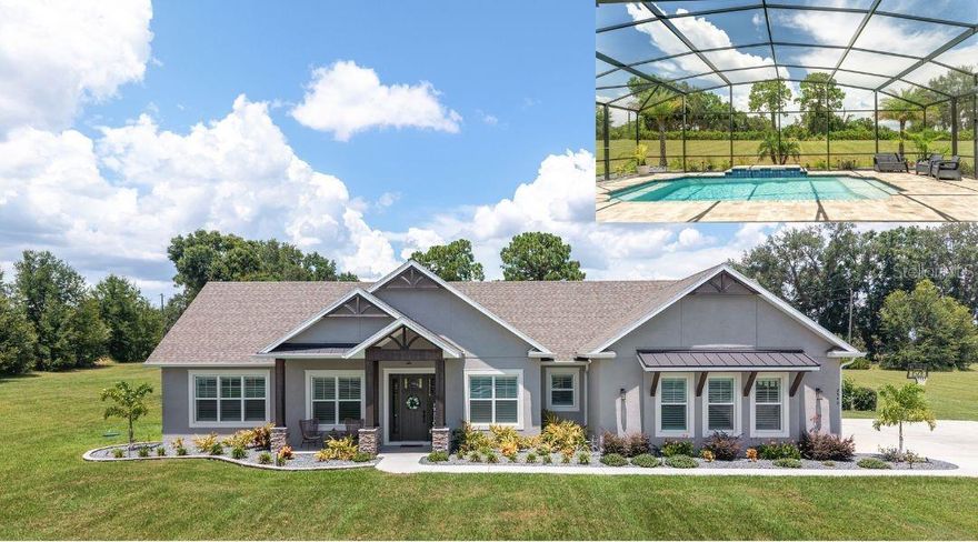 EXPERIENCE LUXURY LIVING in this EXQUISITE, CUSTOM BUILT, ESTATE POOL HOME nestled on 3.86 fenced acres in the EXCLUSIVE gated community of Sumter Crossing! Designed with exceptional craftsmanship and attention to detail, this magnificent property offers privacy, space, and a serene setting perfect for refined living. Stately wood pillars frame the inviting front entrance of this craftsman-style home showcasing metal, wood, and stone exterior accents. A quaint front porch and generous foyer welcome you in to the bright open floor plan that effortlessly connects the kitchen, dining, and living spaces, making it ideal for both everyday living and entertaining. Soaring 11-foot ceilings accented by custom wood beams add to the grandeur of this exquisite space. Whether you're hosting gatherings or enjoying a quiet evening at home, this open-concept design offers the perfect blend of functionality and freedom. For added convenience a home office with built-in closet is located just off of the foyer. The stunning custom kitchen is the heart of the home, combining high-end finishes with thoughtful functionality. Crisp white cabinetry paired with sleek quartz countertops, creates a clean, timeless look. The spacious center island, complete with a built-in sink, offers additional prep space and seating-perfect for casual meals. Cooking enthusiasts will love the double oven, designer hood, and wall-mounted pot filler, making meal prep a breeze. A stylish tile backsplash and under-cabinet lighting add both elegance and practicality. Just off the main kitchen, a butler's pantry provides extra storage and prep space. This kitchen is truly a chef’s dream with no detail overlooked! From the living room, an elegant French door invites you into the INCREDIBLE OUTDOOR OASIS of the lanai and POOL area! This fabulous space features paver floors, and a summer kitchen with sink and mini-refrigerator — perfect for effortless entertaining. Soak up the sun on the spacious deck, dive into the refreshing pool, or simply sit under the covered lanai and enjoy the beauty of this amazing backyard paradise! Retreat back indoors to the luxurious primary suite. The spacious bedroom is a showstopper, featuring an elegant tray ceiling adorned with crossed wood beams. Its custom walk-in closet offers boutique-style storage and center island. The spa-inspired en-suite bathroom boasts white cabinetry, quartz tops, double sinks, and two built-in linen closets Relax in the freestanding soaking tub or indulge in the double-entry Roman-style walk-in shower, clad in Carrera tile, and boasting dual shower heads for a high-end experience. A split floor plan offers three additional bedrooms and a second bathroom. Bedroom 2 features a built-in closet while bedrooms 3 and 4 each boast custom walk-in closets.The second bathroom showcases white cabinetry, quartz tops, double sinks, and tiled tub/shower combination. A convenient mud room is located just off of the kitchen. There’s also an additional cabana-style half-bath -easily accessed from the pool and lanai. The centrally-located laundry room boasts a built-in utility sink and plethora of additional cabinetry with quartz tops. Completing the package is a 820sf 3-car garage! This fantastic space showcases epoxied floors and a Magic Attic Lift! PLEASE WATCH OUR VIDEO of this EXCEPTIONAL PROPERTY, and CALL TODAY to schedule your private showing or virtual tour!