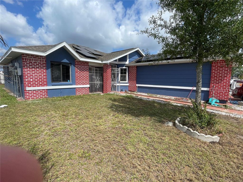 Photo of 13132 Phoenix Woods Lane, Orlando, FL 32824 (MLS # O6402713)