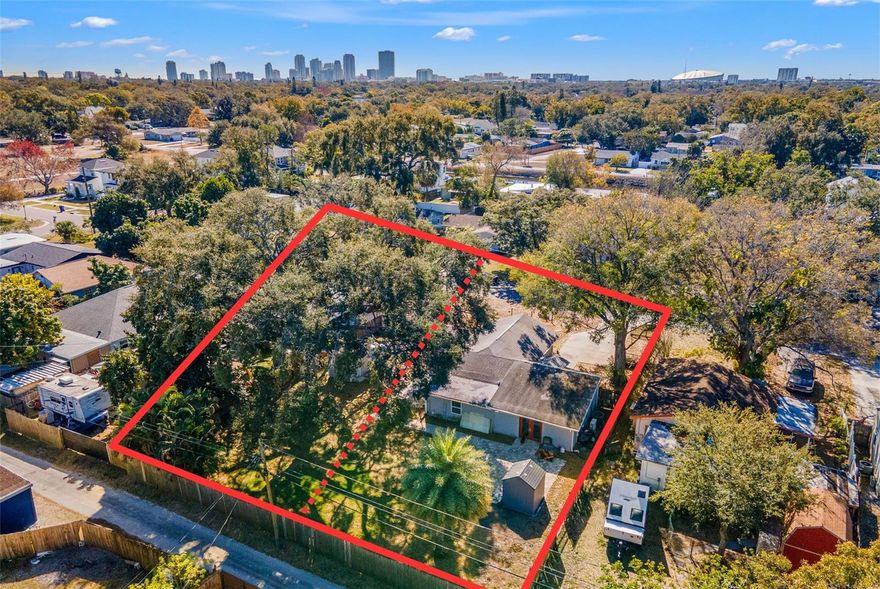 A DOUBLE LOT totaling almost 1/3 of an acre in the middle of St Pete in a Non-Flood Zone! Tear down and build your dream home! BUILDERS - tear down, split the lot, and build 2 brand new homes. This home backs up to an alleyway for easy access if wanting to add a garage or ADU! There is no HOA here and flood insurance is not required. This ideal location is just 2 minutes to I-275, 12 minutes to Downtown St Pete, and just 20 minutes to St Pete Beach! There is an abundance of local restaurants, grocery stores, and parks nearby!