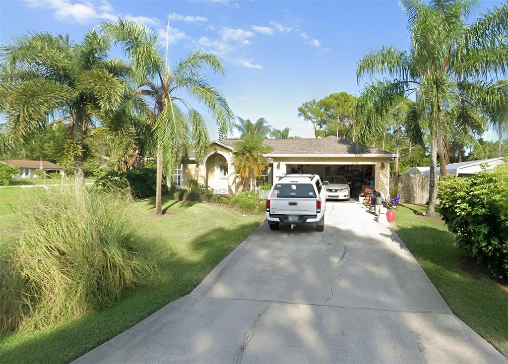Photo of 849 Happiness Avenue SW, Palm Bay, FL 32908 (MLS # TB8524548)