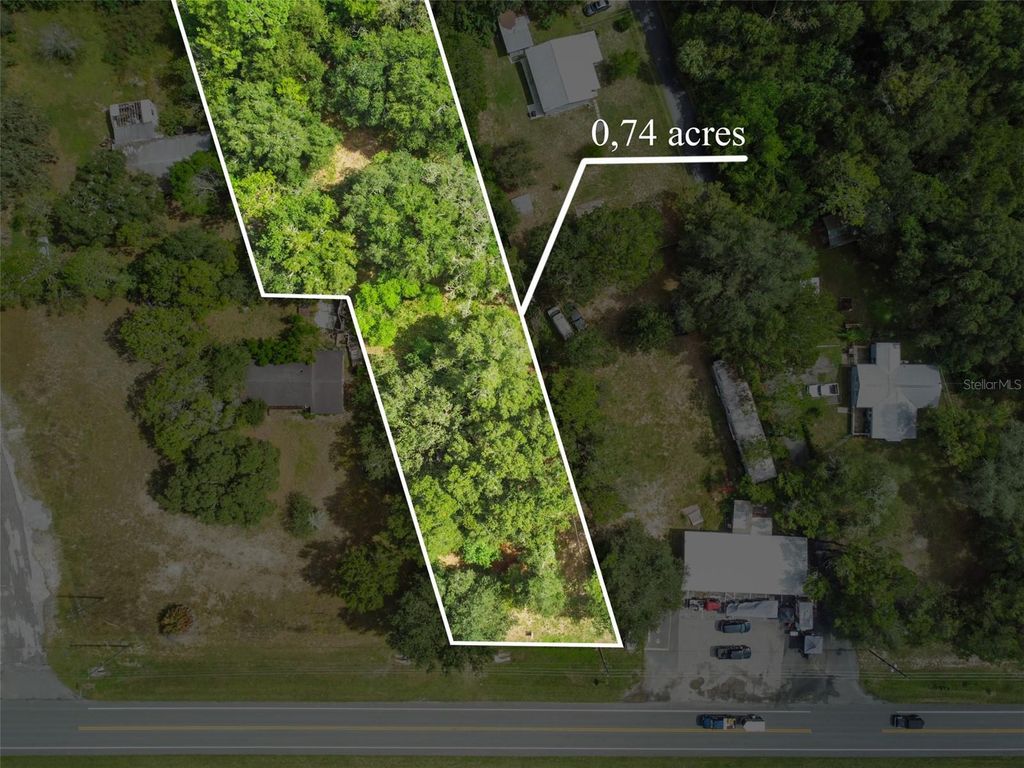 Photo of 8855 E Round Lake Loop, Floral City, FL 34436 (MLS # TB8435608)