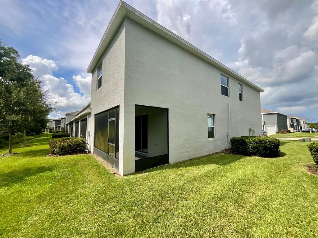 Photo of 1720 Hubbell Road, Wesley Chapel, FL 33543 (MLS # TB8541468)
