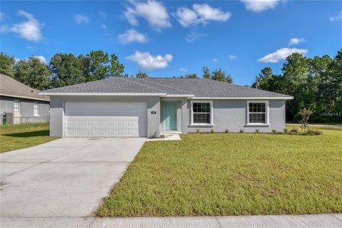 Photo of 256 Marion Oaks Trail, Ocala, FL 34473 (MLS # O6451469)