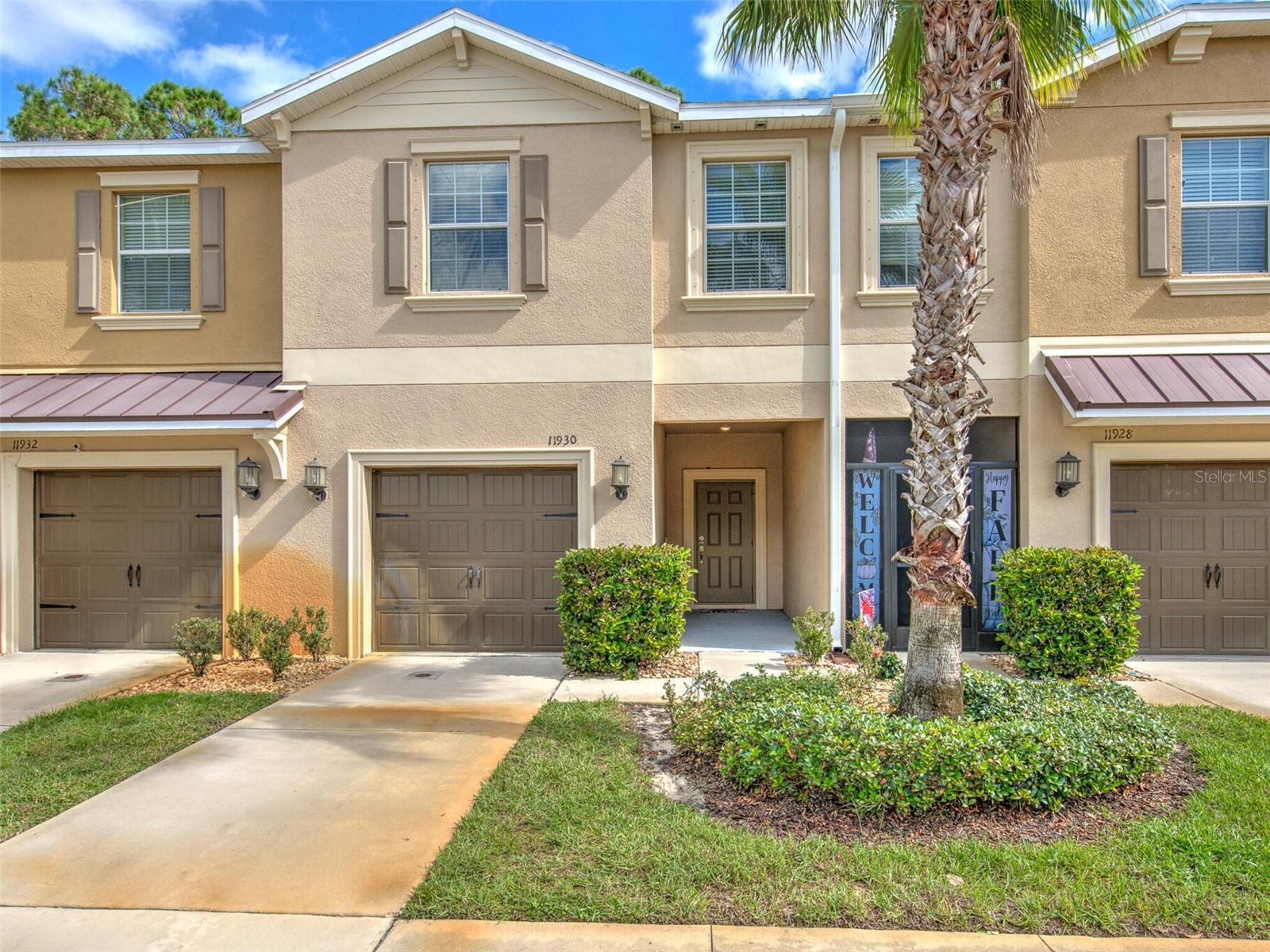 Your DREAM TOWNHOME with CONSERVATION VIEW just MINUTES FROM THE SUNCOAST PARKWAY is now available. Nestled in The Verandahs community, this 3 BR, 2.5 bath, 1 car garage townhome is just what you've been waiting for! Just off State Road 52 in Hudson, this HIDDEN GEM boasts a welcoming & spacious living room with TILE FLOORS laid on the diagonal and leads to an OPEN KITCHEN with GRANITE COUNTERS, wood cabinets, STAINLESS STEEL APPLIANCES, breakfast bar, and pantry. Sliders to the COVERED PATIO offer a great, private view of woods and conservation, and the cherry on top is the HUGE, BRICK-PAVERED and FULLY-FENCED, EXTENDED PATIO. A handy half-bath, coat closet, and 12.5 x 18 SINGLE CAR GARAGE complete the first floor. Head upstairs on your FRESHLY STEAM-CLEANED CARPETS, to a 9x13 BONUS LOFT with DOUBLE CLOSET - great for a home office, game room, or reading area. SPLIT FLOOR PLAN features an enormous master suite (great double window overlooks the conservation) with WALK-IN CLOSET and bathroom with DUAL VANITY and step-in shower. Secondary bedrooms are on the opposite end, at the front of the home. CONVENIENT LAUNDRY ROOM with WASHER & DRYER INCLUDED is upstairs off the hallway. Worried about Florida storms? This unit comes with a complete set of HURRICANE SHUTTERS for your peace of mind. RENT INCLUDES WATER / SEWER & TRASH COLLECTION. With the garage and driveway, you have 2 spots for vehicles, and neighborhood POOL is RIGHT ACROSS THE STREET and it offers PLENTY OF GUEST PARKING. 1 small pet may be considered. Community clubhouse and fitness room is also available for residents. Just over 2 miles from the Suncoast Parkway, this townhome is perfect for folks who like to be out in the country while also having easy access to everything that the Tampa Bay area offers! Heck, with no traffic you can get to Tampa International Airport in 30 minutes. Like to bike or run? The Suncoast Trail is just down the street and is 55 miles of paved, peaceful, recreation time. Vacant and READY FOR IMMEDIATE MOVE-IN, call today!