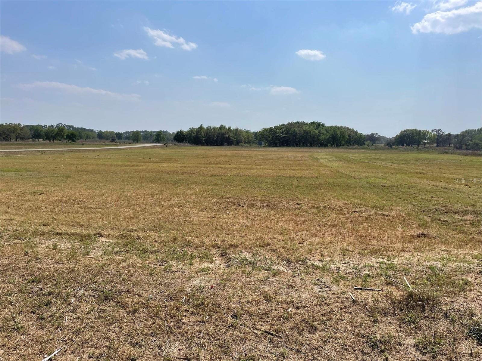Welcome to the Gated Community of Oak Pointe Preserve! Lot 12, This spacious lot sits atop the hill and it's corner lot with no rear neighbors. This community has 29 lots surrounded by ponds, lakes, and oak trees. There is no required timeframe for building and the community has very low HOA fees. It is zoned X which does not require any flood insurance. No horses, no chickens.