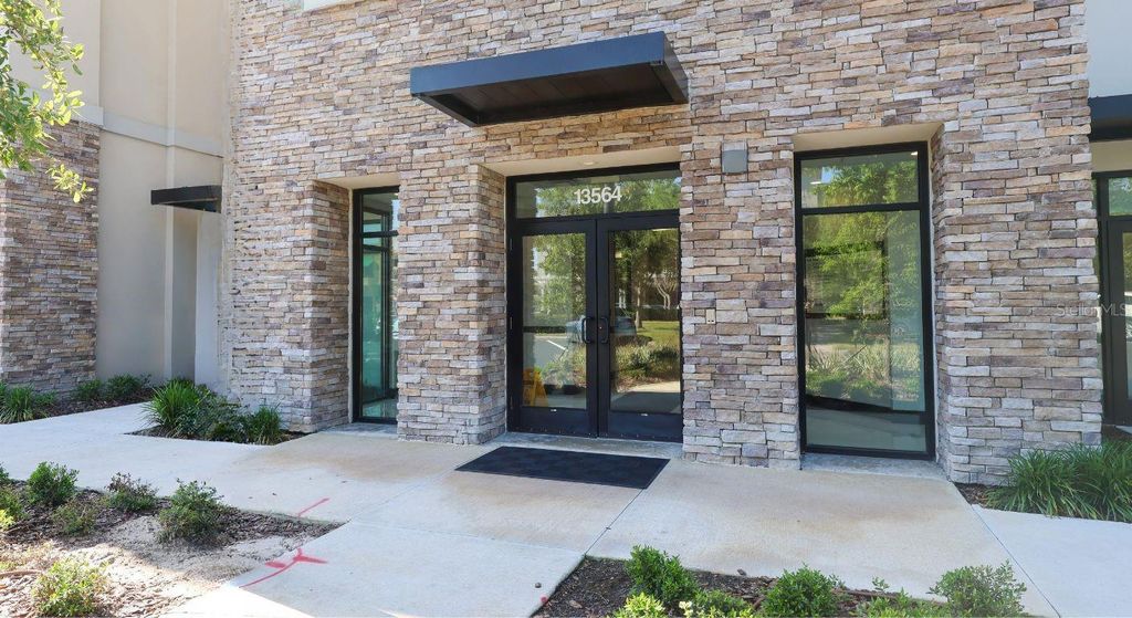 Photo of 13564 Village Park Drive #O-365, Orlando, FL 32837 (MLS # S5148016)