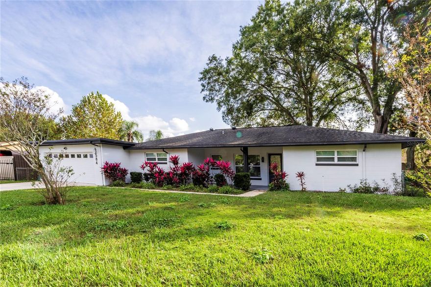 Impeccable, Fully Remodeled 3/2 with Huge Bonus Room Convenient to UCF!
You will love this sleek, light, bright, minimalist, clean, completely remodeled 3/2, complete with fenced back yard and full sized shed for storage. Every surface has been updated from stone counters, all new appliances, ceiling fans, bathrooms, fixtures, flooring, paint and more. Hard surface, tile flooring throughout for easy maintenance. A large bonus sun room has a mini-split HVAC with abundant light and space, suitable for a playroom, office, studio or whatever you can dream up. The location boasts an easy commute to downtown, airports, universities, shopping, dining, and more.