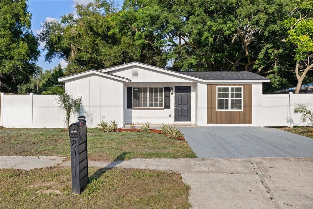 Photo of 8711 N River Forest Circle, Tampa, FL 33604 (MLS # TB8535430)
