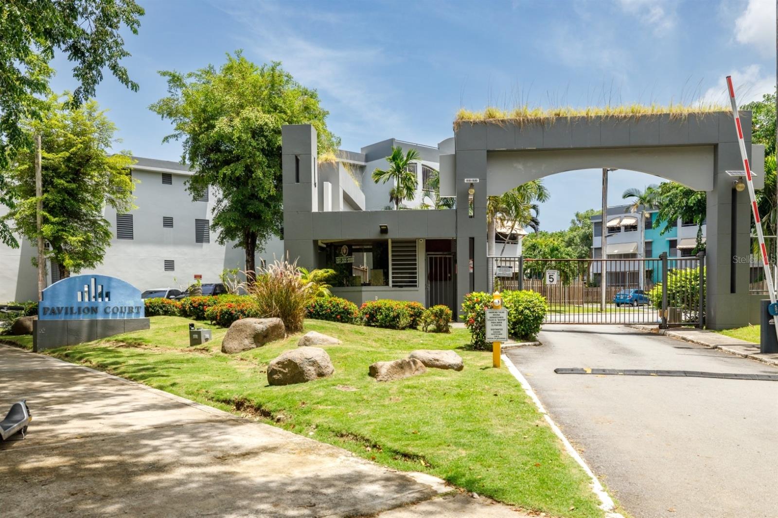 Now available for rent at Pavilion Court in Hato Rey, this modern garden apartment offers a unique combination of indoor comfort and outdoor living in one of San Juan’s most convenient locations. The unit features 3 bedrooms, 1.5 bathrooms, and 1 assigned parking space. Inside, you’ll find an open living and dining area connected to a fully remodeled kitchen with contemporary finishes. The apartment is fully equipped with air conditioning in every room, providing comfort year-round. A private wooden deck and patio extend the living space outdoors, perfect for relaxing or entertaining. Pavilion Court residents enjoy excellent amenities including 24/7 security, a park, basketball and tennis courts, and a gazebo for gatherings. The location is unbeatable — just minutes from the Puerto Rico Coliseum, Plaza Las Américas, and major highways for quick access to the rest of the metro area. Rental price: $1,800 per month. Don’t miss this opportunity to lease a beautifully renovated apartment with private outdoor space in the heart of Hato Rey. Call the listing agent for more information and to schedule a private showing.