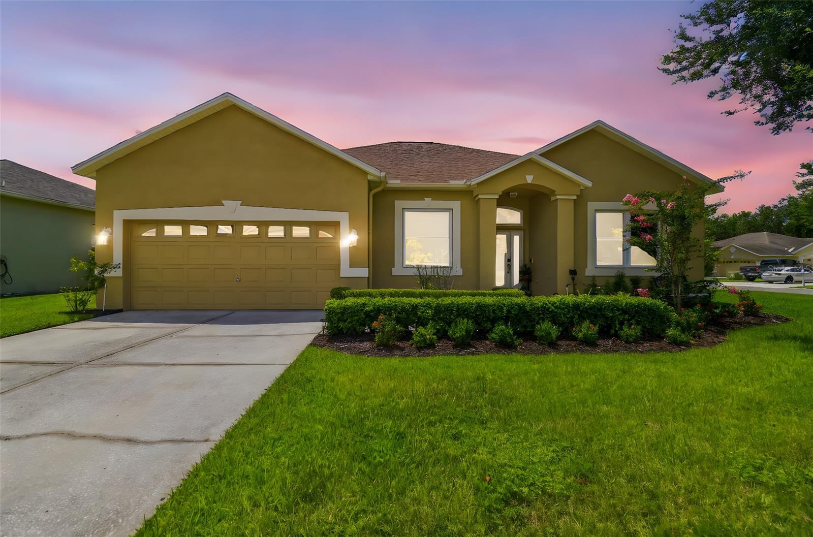 Desirable Location in the Gorgeous community of Stagecoach. Split Floorplan with 4 bedrooms, 2 bath and a 2 car garage! ***Windows & Doors 2021**Roof 2019** A/C system 2019**Stainless Steel Appliances 2021**Water Heater 2017. The Formal living room and dining room at the front of the home are perfect for family gatherings. The Master bedroom is on the opposite side of the other 3 bedrooms and features a walk-in closet and a master bathroom retreat with dual vanities, walk in shower, bathtub and a water closet. The kitchen is open to the family room which makes it a perfect open concept entertaining space. Bedrooms 2, 3 & 4 are locatedon opposite side of home with a a private bathroom that features a double Vanity Sinks, bathtub/shower and toilet. This Oversized Lot is beautifully maintained. The exterior of the home was painted in 2019. *****NO CDD FEES & Low HOA. Stagecoach features a resort style clubhouse, community pool, fitness center, playground, basketball and volleyball court. Great location with easy access to I-75 and I-275. Close to all the Great New Restaurants and Shopping at the Tampa Premium Outlets and Wiregrass Mall.