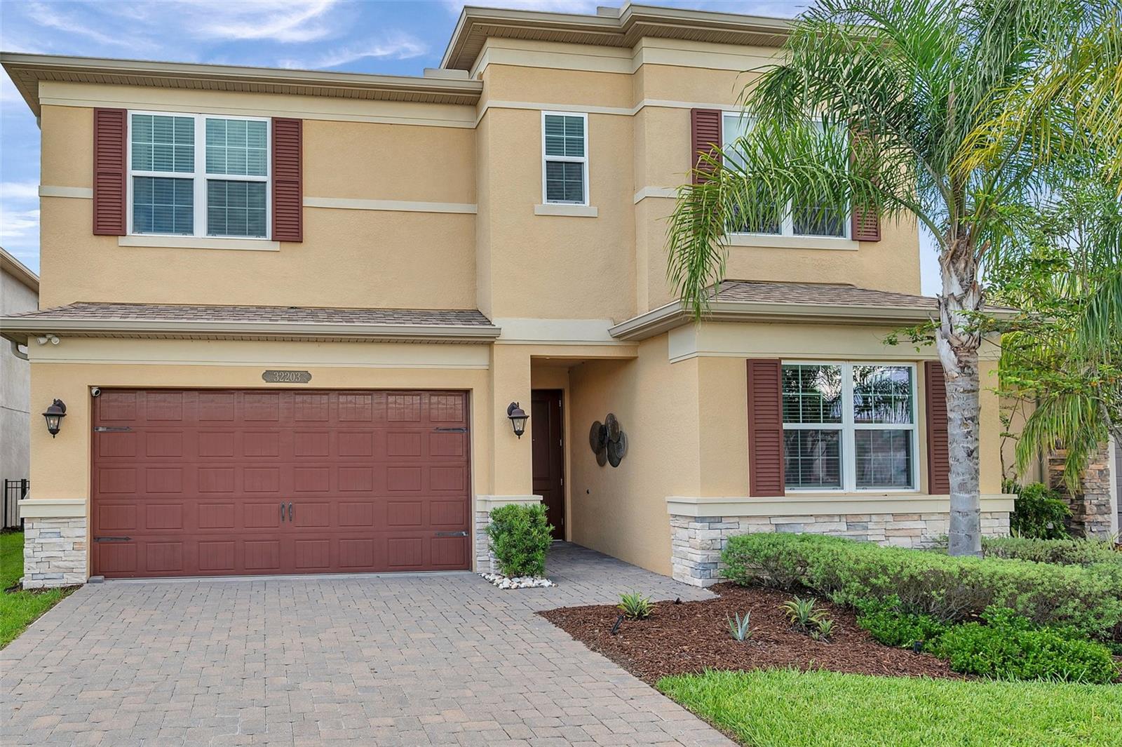 Welcome to the former MODEL HOME by GL HOMES— a beautifully appointed 3-bedroom, 3-bathroom home plus an OFFICE and a FLEX ROOM located in the highly desirable Winding Ridge community with NO CDD fees. Boasting an open split floor plan with nearly 2,600 sq ft of living space, this tastefully designed move-in ready home features a modern kitchen with quartz countertops and stainless steel appliances, a spacious primary suite with dual vanities and soaking tub, and a versatile bonus/flex room. The owners upgraded the NEW TILE throughout the first floor and renovated the bathroom to the luxury spa like escapes. All light fixtures in the house have been upgraded as well. The outside area is extremely private on the oversized lot backing to the wood preserves.
Indulge in LUXURY at the Resort-Style Clubhouse, where every detail enhances your lifestyle. Outdoor amenities feature a covered patio overlooking the pool, a wet play activity center, Pickleball and Tennis courts, a full basketball court, a shaded playground, an open playfield, and a party pavilion. Indoors, discover a social hall, catering kitchen, indoor sports complex, game room, and a multi-purpose room for fitness classes, all complemented by a fully equipped fitness center. Enhancing your experience is a Full-Time Party Coordinator who organizes club activities and events. The Winding Ridge community offers a GATED, maintenance-free lifestyle with the HOA FEE covering LAWN MAINTENANCE, landscape maintenance, fertilization, mulching, and exterior pest control. Your new home is conveniently located just minutes from Wesley Chapel’s Top-Rated Schools, near I75 on SR56, Wire-Grass Mall, Tampa Premium Outlets, Hospitals, Restaurants, and more. This is your gateway to a vibrant and convenient lifestyle. With over $80,000 in UPGRADES, this home is a true stunner. Come to see it today!
