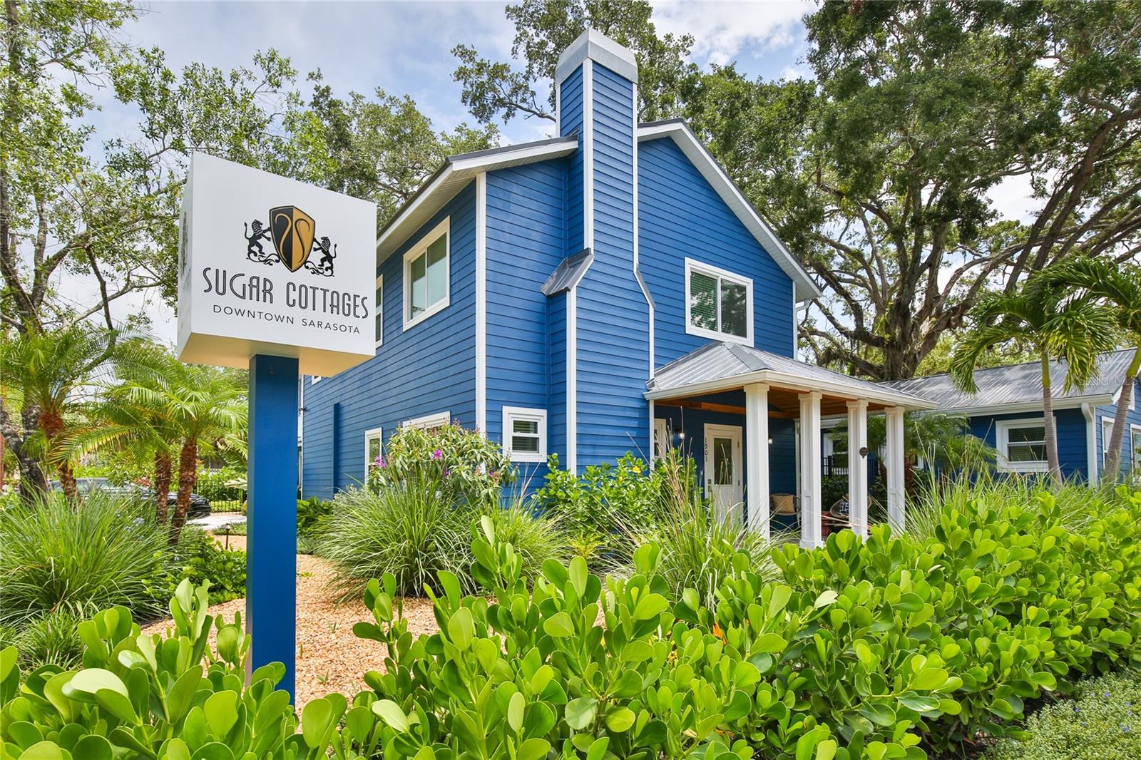 Welcome to the heart of Sarasota's historic district, Towles of Laurel Park, where this exceptional compound awaits. Comprising three distinct residences, this property offers a world of possibilities. Completely renovated inside and out, this unique gem is move-in ready! Set on an expansive corner lot spanning over a quarter-acre, this multi-faceted property presents an array of options. The main residence (1901) is a two-story haven featuring four bedrooms (only one bedroom downstairs is furnished) with an office that could be used as a bedroom (it does have office furniture) and 3.5 bathrooms. Dishware and linen are not provided. It's a blend of classic charm and modern convenience, thoughtfully updated to meet the demands of contemporary living. Recent exterior updates include a new metal roof (2022) and HardiPlank siding. Inside, you'll find a plethora of improvements. Oversized impact windows and sliders fill the space with natural light, highlighting the luxury vinyl plank flooring, crown molding, and a smartly redesigned layout that seamlessly connects each room. The galley kitchen, adorned with Quartz countertops and stainless-steel appliances, is perfectly equipped. The Quartz bathrooms are beautifully renovated, and the residence boasts a laundry facility for added convenience. There is also a Generac generator which has its own gas line. The brick-paved driveways offer ample parking, and natural wood canopies gracefully shade the breezeways that connect each building. With these exterior updates, you can enjoy the Florida outdoors in style and comfort. Beyond the property's stunning interior and exterior renovations, its location adds to its appeal. Situated in the vibrant heart of downtown Sarasota, you're just a stone's throw away from the city's cultural and entertainment hub. The bayfront and pristine Gulf beaches are also nearby, catering to those who relish arts, entertainment, and an active lifestyle. Neighboring recreational amenities like golf, tennis, pickleball and fitness centers are perfect for staying active and enjoying the beautiful Florida weather. This meticulously updated and versatile compound promises a rare and remarkable downtown lifestyle.