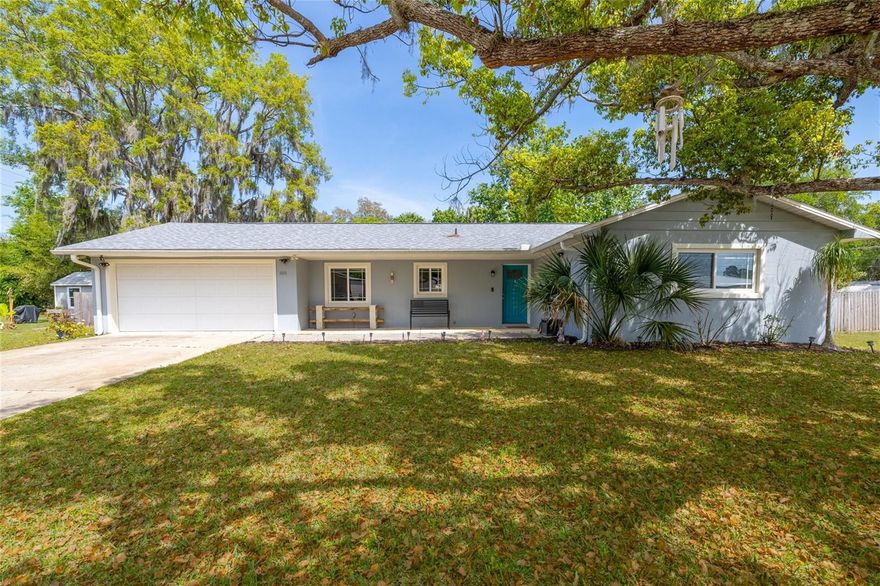 Move-in ready with a NEW roof and NO HOA! This well maintained 3 bedroom, 2 bath concrete block home sits high and dry (never flooded), on an oversized 120' x 125' TRIPLE lot in the desirable (North) Florida Shores neighborhood. Enjoy a large fenced backyard with mature trees, plenty of space for boat or RV parking and outdoor entertaining. The property also features installed security cameras, a large utility shed for additional storage and a spacious driveway for extra parking. Inside, you'll find a bright open floor plan filled with natural light throughout the main living area and Florida room. The updated kitchen features a large breakfast bar, stone countertops, stainless steel appliances, and beautiful cabinetry, making it perfect for both everyday living and entertaining. Additional upgrades include laminate flooring, updated lighting, and ceiling fans throughout. Both bathrooms have been recently remodeled, and the spacious primary suite includes a walk-in closet. The oversized two car garage includes a laundry area and workspace, adding extra functionality and storage. Located on a quiet street only 5 minutes from I-95 and US 1, with easy access to boat ramps, waterfront parks, and the Intracoastal Waterway nearby. A short 10 minute drive to Downtown New Smyrna Beach, beautiful beaches, shopping, and some of the area's best restaurants. Rare opportunity to own a spacious property with room for all your toys in a great location close to everything Southeast Volusia County has to offer. All information is deemed to be accurate but to be verified by purchaser. Property owned by listing agent.
