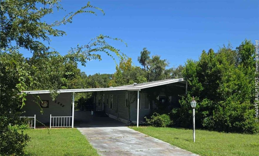 Home is in the small 55+ community of Las Brias.  This home is right next to the pool !   .  Low HOA fees.  Home has 2 suites , with both bedrooms attached to a bath.  Inside laundry  for convenience .  Kitchen has an eat in island and a Florida Room, formal iving room and family room, lots of space!  There is a small workshop for puttering.  Close to shopping.