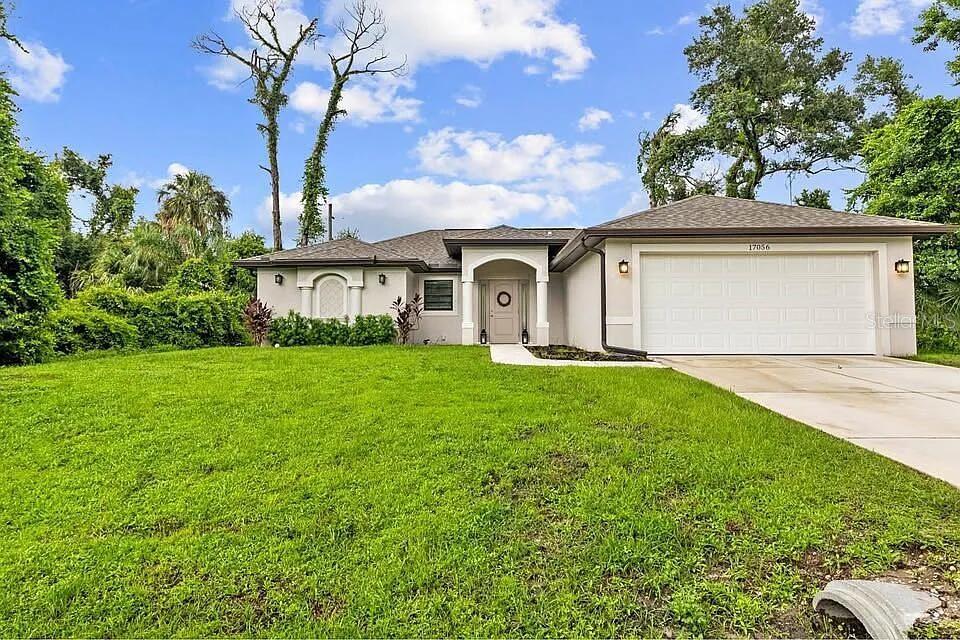 Photo of 2492 Jacobs Street, Port Charlotte, FL 33953 (MLS # O6435566)