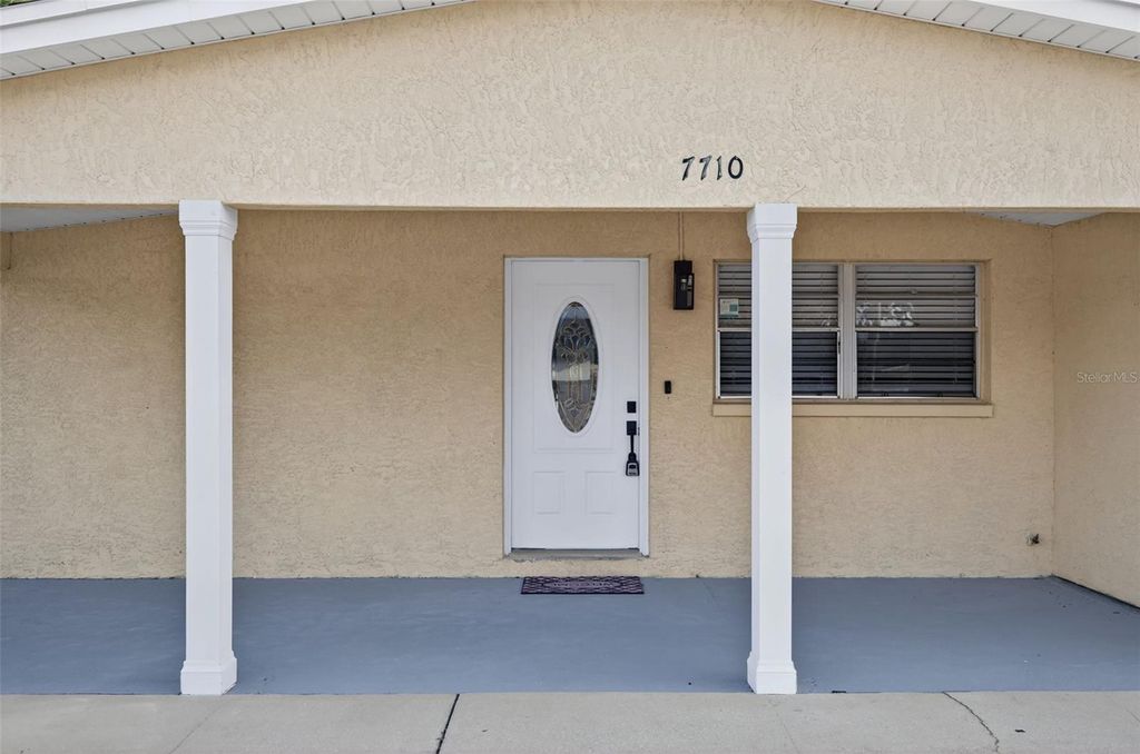 Photo of 7710 Brookside Lane, Tampa, FL 33615 (MLS # O6353131)