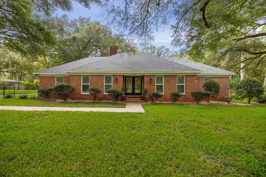 Photo of 11207 NW 14th Avenue, Gainesville, FL 32606 (MLS # GC543226)