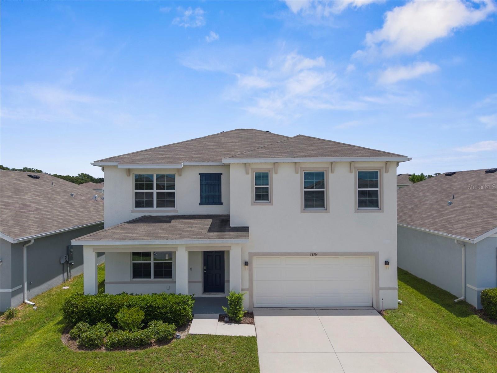 Spacious 5-Bedroom Home in Desirable Wesley Chapel Community!
Welcome to 34314 Jasper Stone Drive—a beautifully maintained 5-bedroom, 3-bathroom home offering over 2,600 sq ft of comfortable living space in one of Wesley Chapel’s most sought-after communities.
Step inside to discover brand new luxury vinyl plank flooring on the main level and a thoughtfully designed floor plan perfect for families of all sizes. The open-concept kitchen is the heart of the home, featuring modern appliances, ample cabinet space, and a large island—ideal for entertaining or casual family meals.
Downstairs, you'll find a private bedroom and full bath—perfect for guests, a home office, or an in-law suite setup. Upstairs, there are four generously sized bedrooms, including a spacious primary suite with an en-suite bathroom and walk-in closet.
Located in a well-maintained, family-friendly community, residents enjoy easy access to top-rated schools, shopping, dining, parks, and major highways. This neighborhood offers a peaceful setting while keeping you close to all the amenities Wesley Chapel has.
Don't miss your chance to own this move-in-ready home with room for everyone!