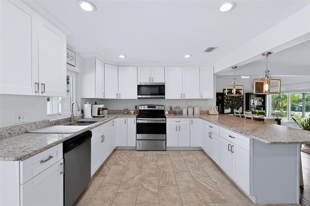 Photo of 615 Brookside Drive, Clearwater, FL 33764 (MLS # TB8553672)