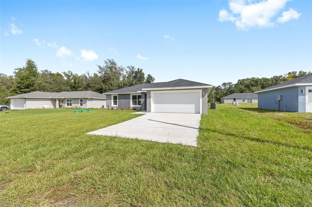 Photo of 13269 SW 113th Place, Dunnellon, FL 34432 (MLS # OM712477)