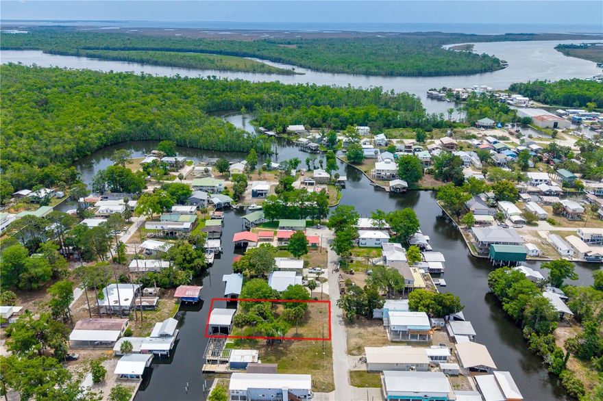 Discover the perfect waterfront getaway with this rare 0.2-acre vacant lot in Suwannee, Florida, ideally situated on a freshwater canal with direct access to some of North Florida’s most sought-after boating and fishing waters. This property is already equipped for enjoying the coastal lifestyle, featuring a boathouse with two boat lifts—perfect for keeping your vessels protected and ready to hit the water—as well as a convenient storage shed for all your gear and equipment. Located where the Suwannee River meets the Gulf, this unique coastal community is known for its network of canals that provide easy navigation from your backyard to open water. Suwannee River access puts you in the heart of a true sportsman’s paradise, offering both freshwater and saltwater fishing opportunities right at your fingertips. Suwannee is a quiet, laid-back fishing village surrounded by the breathtaking Lower Suwannee National Wildlife Refuge, where miles of coastal marsh, tidal creeks, and natural shoreline create an unmatched setting for outdoor recreation. Whether you enjoy boating, kayaking, scalloping, or simply watching wildlife like dolphins, manatees, and native birds, this area offers an authentic “Old Florida” lifestyle that’s becoming harder to find. With its peaceful atmosphere, abundant fishing, and direct canal frontage, this property is an excellent opportunity to build your dream coastal retreat or invest in a slice of Florida’s unspoiled Big Bend region.