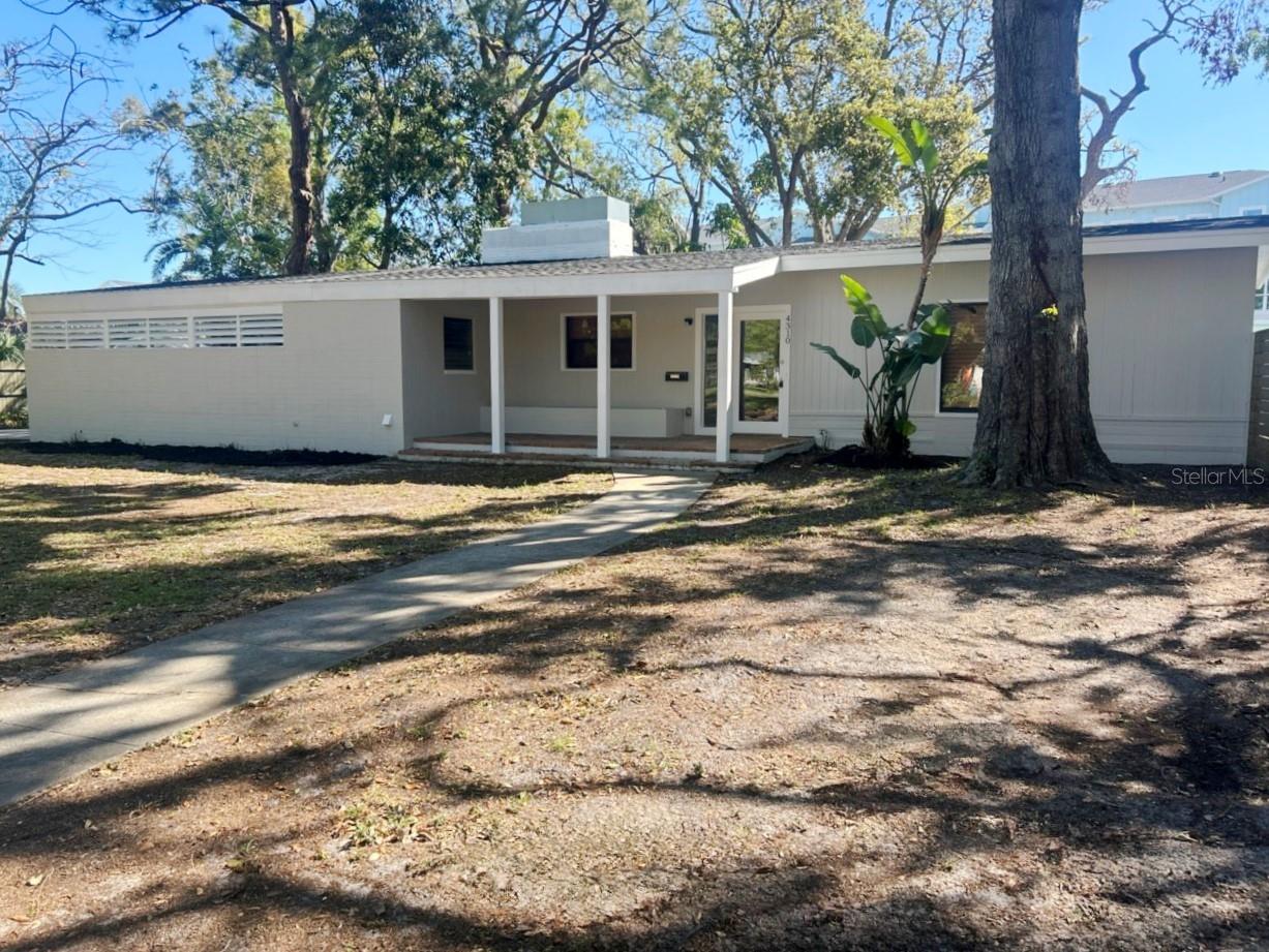MidCentury ranch style home in St Petersburg located on a double lot. Open floorplan with Vaulted ceilings - 3 bedrooms 2.5 bathrooms and a large pool with cabana! New roof, updated interior and flooring. You will enjoy this one of a kind property on a large spacious lot with lots of room for entertaining and room to expand. Close to St Petersburg Golf and Country Club , Downtown St Petersburg and Gulf Beaches.