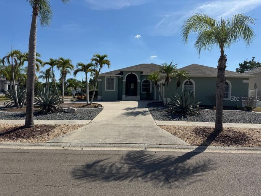 Gorgeous 3 Bedroom 2 Bathroom 3 Car Garage Plus Office/Den Pool Home Located on a Corner Lot in the Quiet & Wonderful Golf & Sea Village Community. Home sits on a premium lot with a large circular driveway to accommodate plenty of visitors for the Holidays. Home has an open floorplan and split bedrooms with luxury vinyl flooring throughout. The living room features a triple pocket sliding doors leading out to the amazing pool. The kitchen overlooks the living room and features a dinette area with granite countertops, a breakfast bar, walk-in pantry, plenty of cabinet space and stainless-steel appliances including the range, dishwasher and microwave. The Primary Bedroom suite has TWO walk-in closets, a private bathroom with dual sinks, a garden tub and a separate shower. Home also features two additional spacious bedrooms, an inside laundry room, ceiling fans, upgraded fixtures, and an epoxy garage floor. The exterior patio area is covered and screened which makes perfect for cookouts while the sparkling pool is great for relaxing and cooling off during those hot days. The backyard is fenced which is perfect for the pets to play. The community has NO CDD and only a $100 Voluntary Yearly HOA fee. The location is great just minutes from everything including shopping, entertainment, restaurants, schools, beaches, golf courses, and expressways. Please call to schedule a showing today!