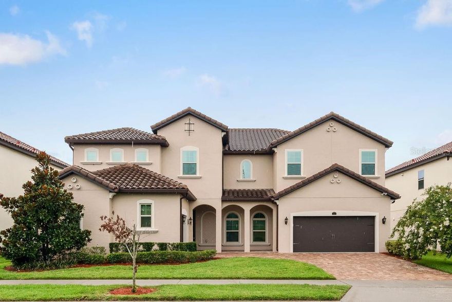 Spacious 6-bedroom, 4-bath Windermere home with dual master suites, pond views, and a fenced yard. Built in 2014, this residence features an open layout with a gourmet kitchen, granite counters, stainless steel appliances, and 42” cabinets. Upstairs includes a loft/media room and generously sized bedrooms. Enjoy serene water views, a private backyard, and a 3-car garage. Located in a desirable community with easy access to schools, shopping, and major highways.