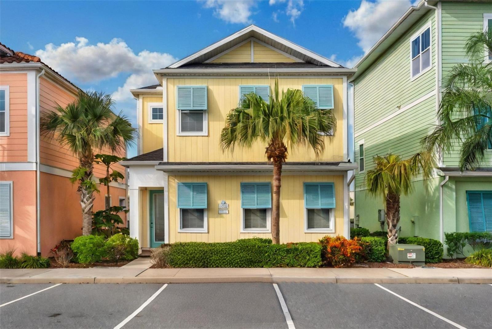 PHASE 1 WATERFRONT 3 bedroom cottage in the heart of Margaritaville Resort located just 5 minutes from Disney! Just steps from the resort amenity area, this immaculately kept, highly desirable, 1818 floorplan cottage comes fully furnished. The spacious open floorplan home offers sweeping water views from every area of the downstairs living and eating space, a pool bath, has 3 bedrooms, all with their own en suite bathrooms, along with quartz countertops, wooden stairs, private owners closet, high ceilings, sizable balcony overlooking the lagoon, and so much more. The large fenced in patio features a private, heated pool and spa, ample eating and entertaining space, all while taking in the shimmering water views. This property can be used as a full time residence, second home, or short term rental property. This resort style community features two large swimming pools, multiple restaurants and bars, fitness center, full service spa, lush and tranquil walking trails to all ends of the community, as well as a moments walk to all of the restaurants, bars, shops and entertainment that Sunset Walk has Low maintenance resort living includes fully maintained grounds, home exterior, lawn care, and 24/7 roaming security.