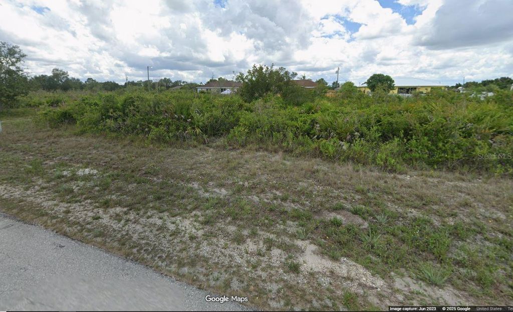 Photo of 2707 64th Street W, Lehigh Acres, FL 33971 (MLS # OM712901)