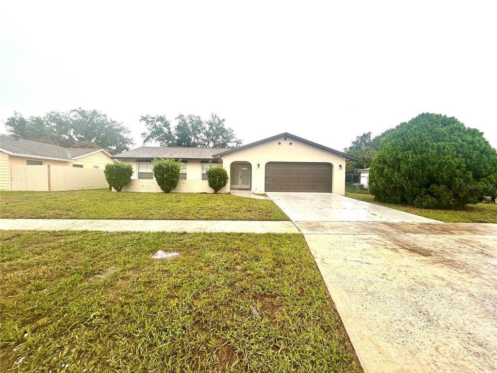 Photo of 6203 Tebbetts Drive, Orlando, FL 32808 (MLS # O6448577)