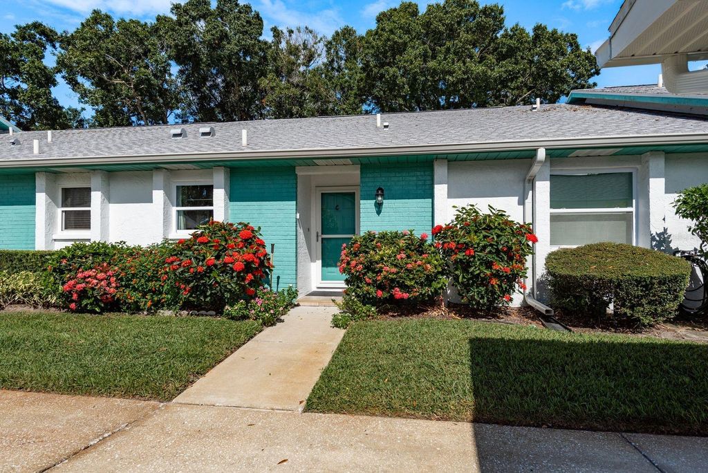 Photo of 1109 Tartan Drive #C, Palm Harbor, FL 34684 (MLS # TB8433661)