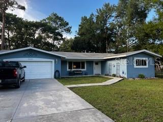WELCOME TO THIS COUNTY OASIS IN RIDGE MANOR CONVIENANTLY JUST LOCATED OFF 301. THIS 3/2 HOME BOOSTS A WIDE-OPEN FLOORPLAN WITH A HUGE KITCHEN THAT WOULD BE GREAT FOR A BAKER! THERE IS A WOOD BURNING OLD TIME FIREPLACE IN THE MIDDLE OF THE LIVING ROOM FOR YOUR WARMTH IN THE FLORIDA WINTERS. THE HOME HAS LUXURY VINYL PLANK THROUGH OUT, SPLIT FLOOR PLAN, UPDATED BATHROOMS WITH NEW FIXTURES AND VANITIES, NEW PELLA WINDOWS, NEW DOORS, ROOF 2014, FRESHLY PAINTED INSIDE AND OUT. NICE STONE DECK OUT BACK FOR ENTERTAINING AND A HUGE FIREPIT FOR THOSE COLD EVENINGS. THE BEST PART IS A DETACHED 1 BEDROOM 1 BATH COTTAGE GREAT FOR PARENTS OR FOR RENTAL INCOME! THE COTTAGE COMES FURNISHED AS SEEN. NICE PIECE OF PROPERTY 1.25 ACRES WITH A LARGE FRONT AND BACK YARD. THERE IS A CURRENT HEN HOUSE THAT WILL STAY WITH THE PROPERTY, GREAT FOR FRESH EGGS DAILY! THE PICTURES DONT JUSTIFY THE HOME ITS STUNNING IN PERSON! CALL OR TEXT TODAY TO SEE WONT LAST LONG!