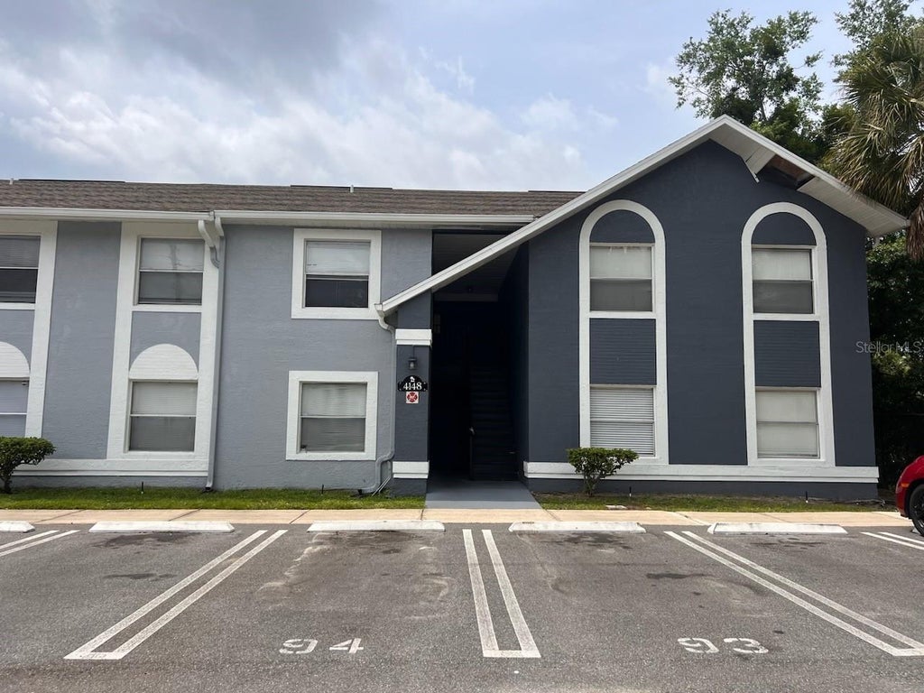 Photo of 4148 Pershing Pointe Place #5, Orlando, FL 32822 (MLS # O6451596)