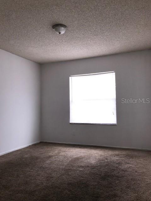 Photo of 4148 Pershing Pointe Place #5, Orlando, FL 32822 (MLS # O6451596)