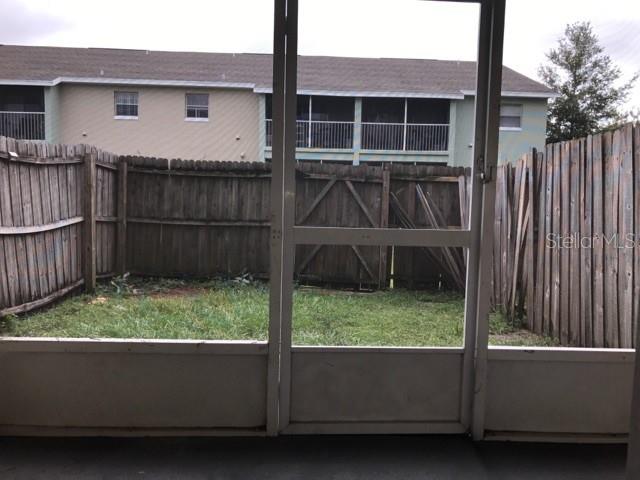 Photo of 4148 Pershing Pointe Place #5, Orlando, FL 32822 (MLS # O6451596)