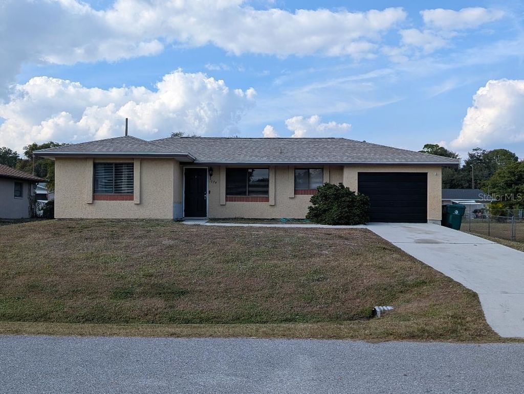 Photo of 1074 Red Bay Terrace NW, Port Charlotte, FL 33948 (MLS # O6363489)